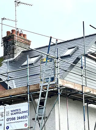 Loft conversion under construction with scaffolding