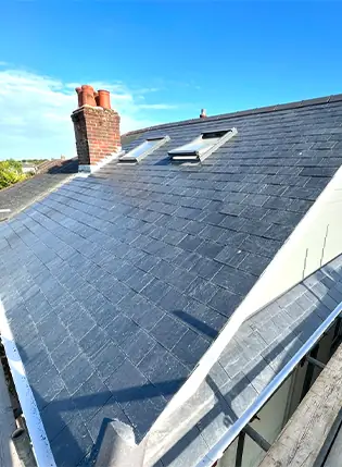 Slate roof with new Velux windows fitted